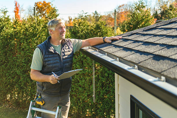 Professional Roofing technician working in Oakland, CA